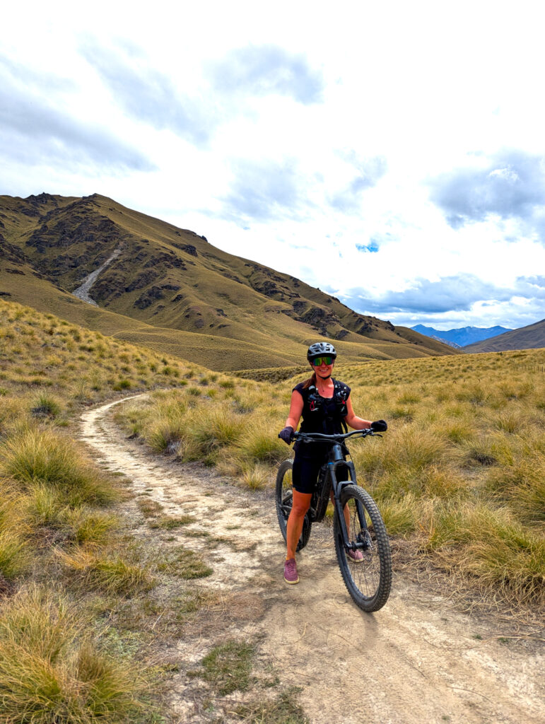 Carolyn on a bike on the Coronet Loop